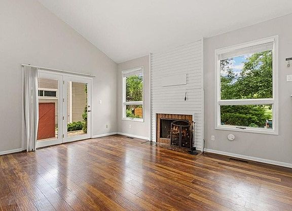 Family Room with Fireplace and Patio Door.