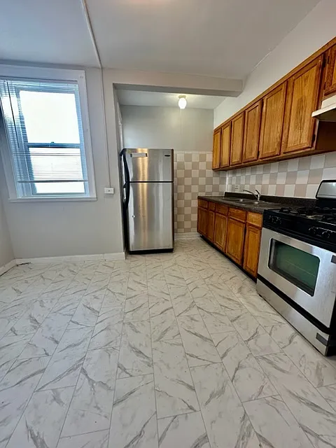 Building Photo - 1259 W 86th St #2