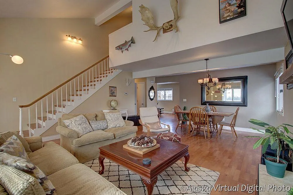 Dining room area and stairs. - Jackpot Bay Cir