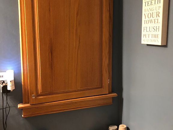 Side A: Upstairs bath storag