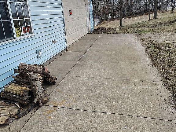 Sidewalk/garage in front