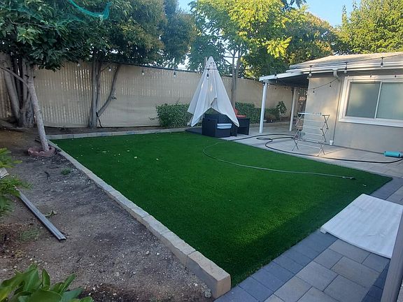 Backyard with no maintenance grass