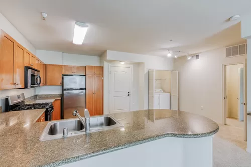 Chef inspired kitchens featuring granite countertops - Windsor Lofts at Universal City