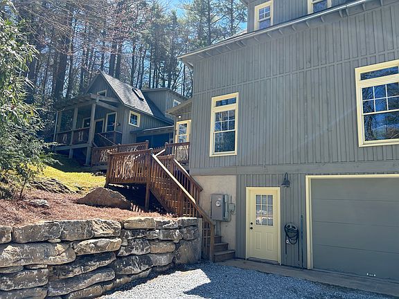 Stairs up from driveway to cottage