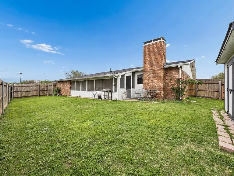 Large back yard with shed