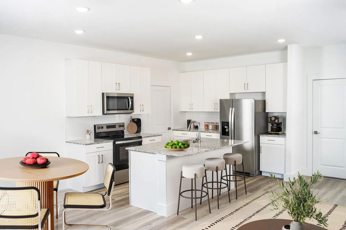Cook in style with gourmet kitchens and stunning granite countertops.