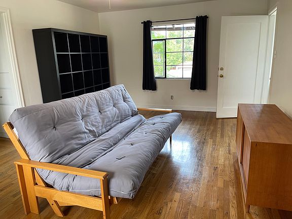 furnished living room and front door