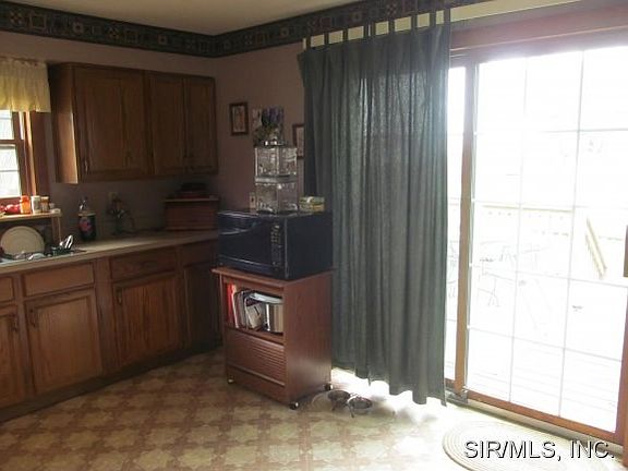 Kitchen Opening to Deck