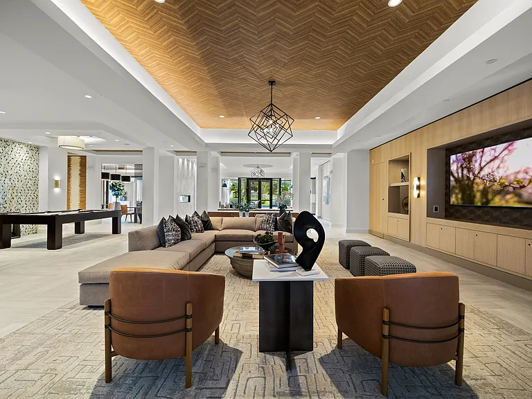 Resident lounge offering ample seating and billiards table
