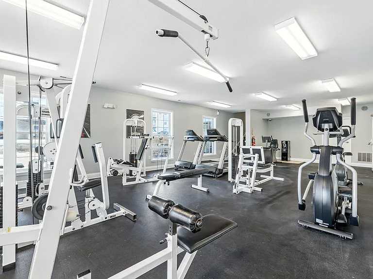 Achieve your goals in a fully equipped fitness space.