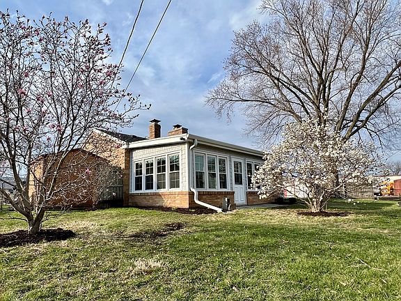 Large back yard with 3 season porch.