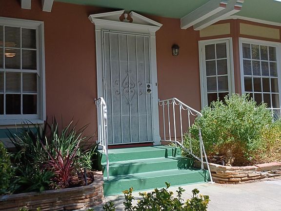 Apt#3 front porch view from garden courtyard