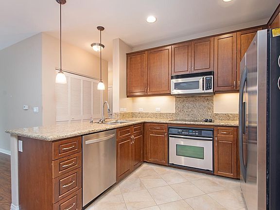 Kitchen with dishwater and 6 months old LG refreigerator