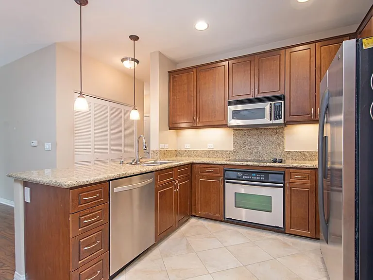 Kitchen with dishwater and 6 months old LG refreigerator