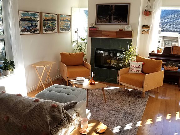 In the mornings the living room is filled with direct light.