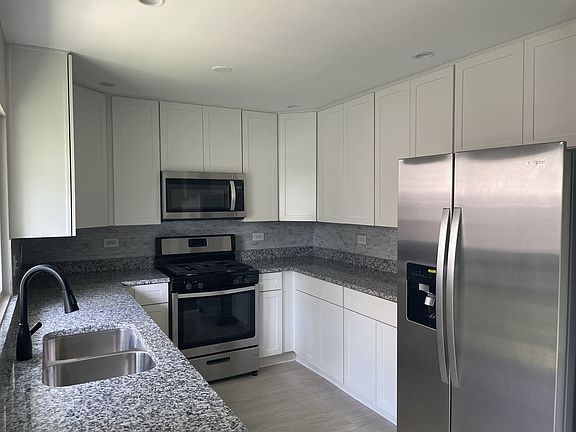 4th image of 1618 John St