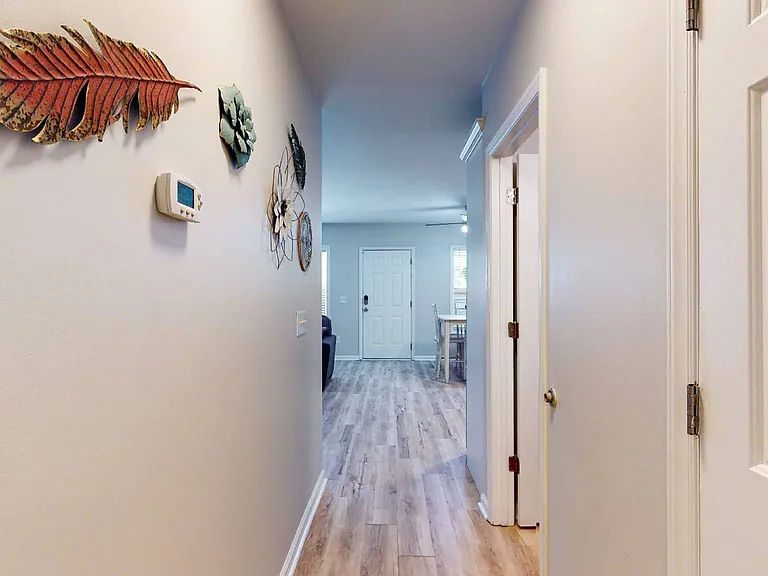 View of hallway going back to front door