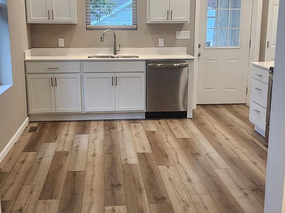 Kitchen cont. - Ceiling fan, easy to clean vinyl plank flooring and recessed led lighting