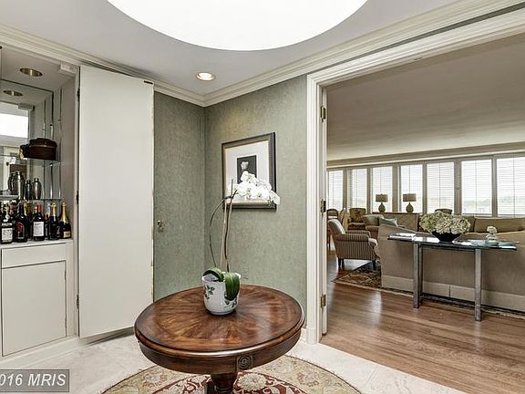 Entry Foyer with Skylight and Custom Closets
