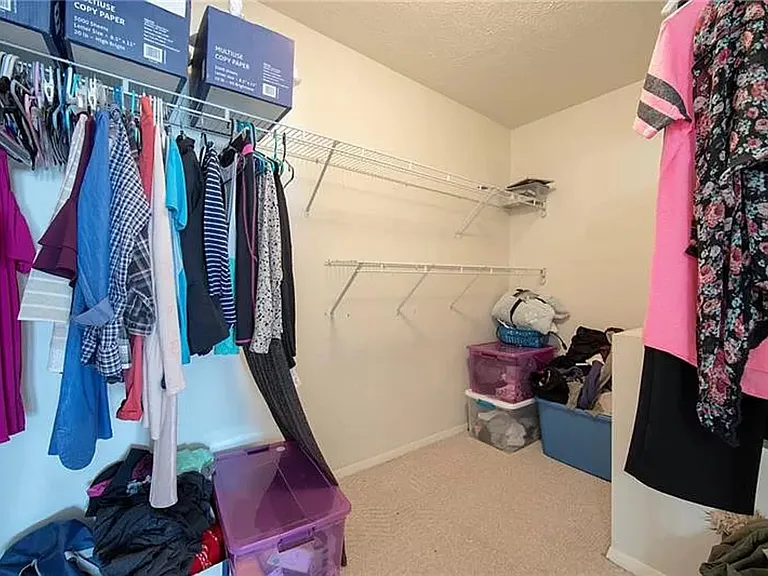 Walk in closet in bedroom