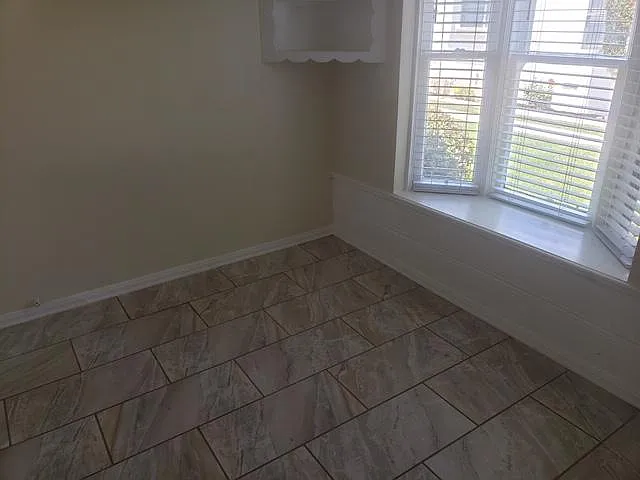 kitchen dining area with bay window