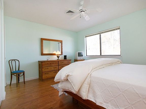Both bedrooms have gleaming wood floors. The Master is en suite.