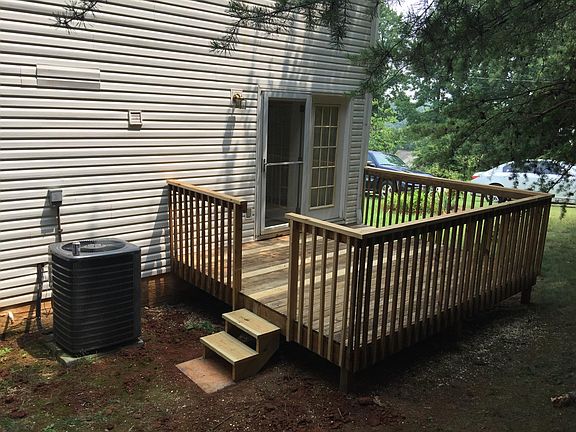 10 by 12 rear deck for entertaining or enjoying a fall evening out grilling.