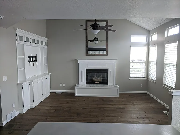 Family room, marble seating by fireplace