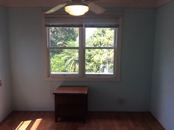 bedroom with view of yard