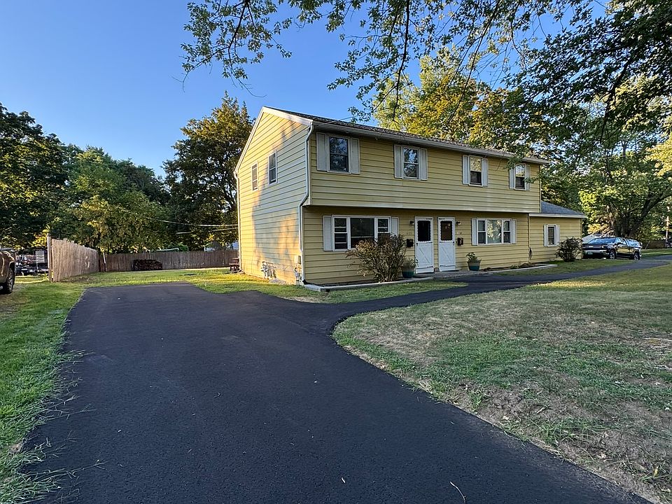Left Side Apt A, dedicated driveway, entrance and back yard
