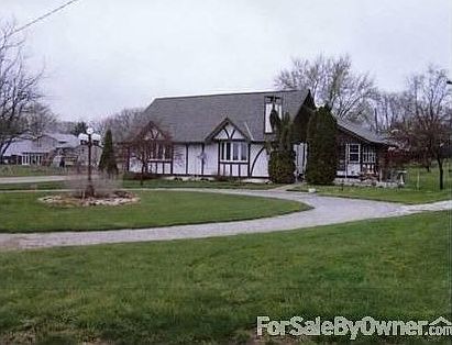 Southside view of the home - Pine Street : Most used entry to home. Circle puts you into sunporch.