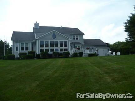 Back of home
						:
						Clad windows and doors and PVC based trim look polished and timeless
