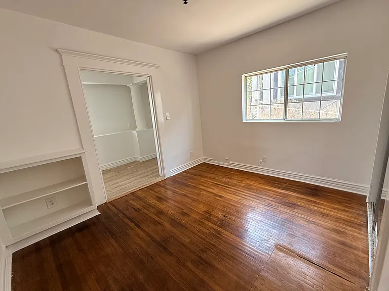 3rd Bedroom has an additional space which could be utilized as an extra large closet, office or storage.