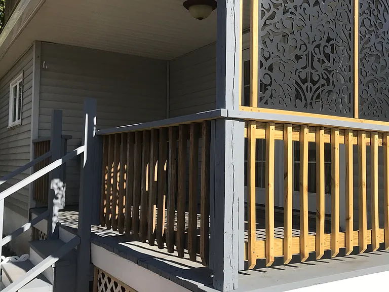 Private deck off of bedroom with access to yard