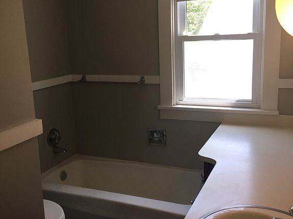 Full bathroom with tub