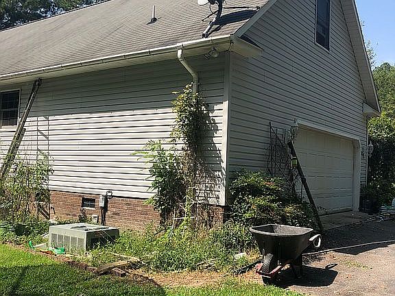 Back garage & room above 
