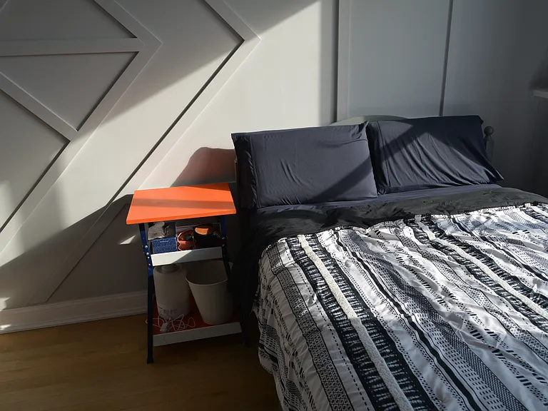 Plenty wide enough for a Queen or even King-sized bed
