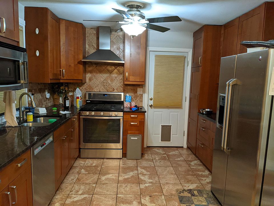 Kitchen and door to the fenced in back yard.
