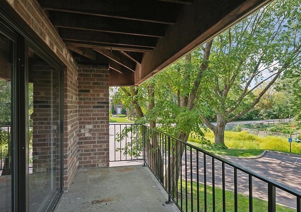 balcony that looks at tennis courts and garden area