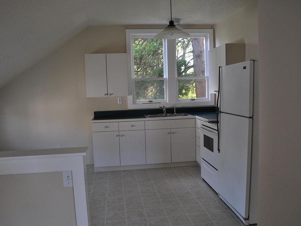 Walk upstairs to the Kitchen