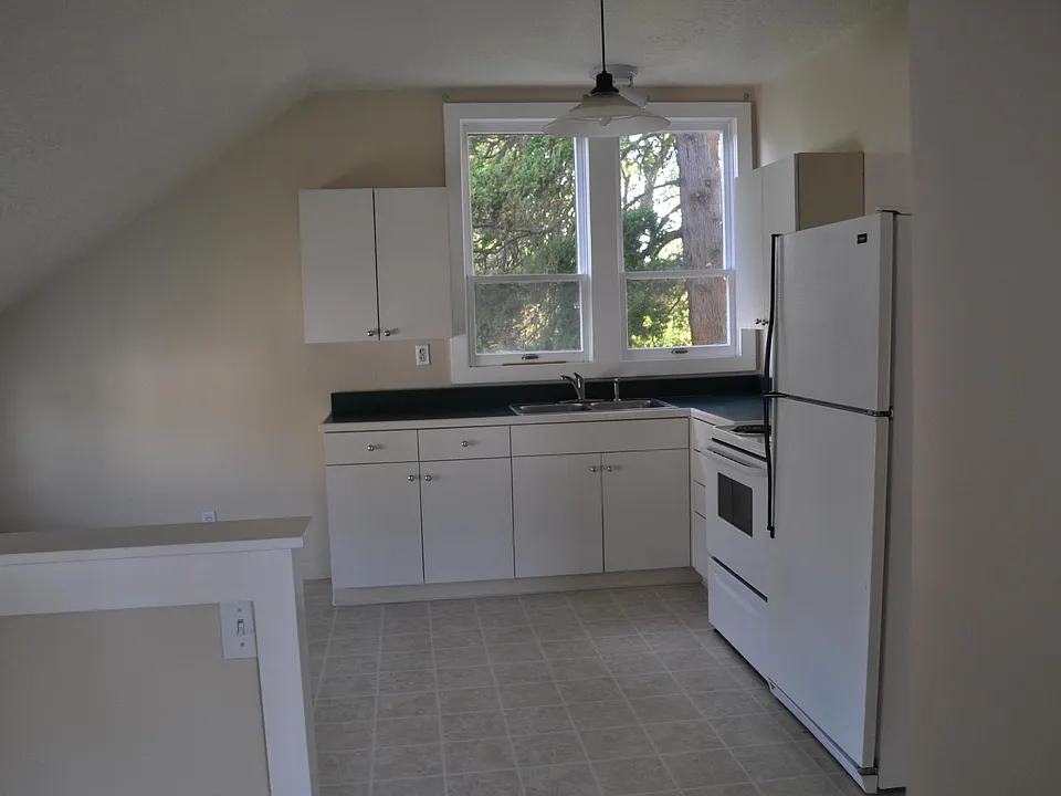 Walk upstairs to the Kitchen
