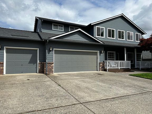 Covered porch. Flat driveway.