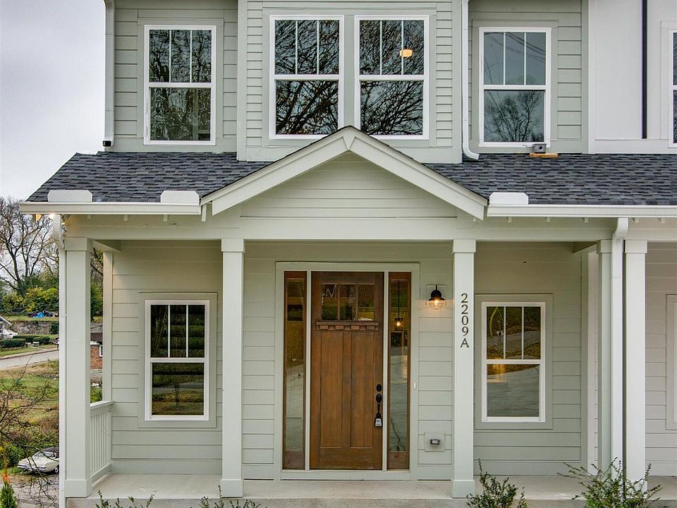 Front of home w/ 2 dedicated parking spots