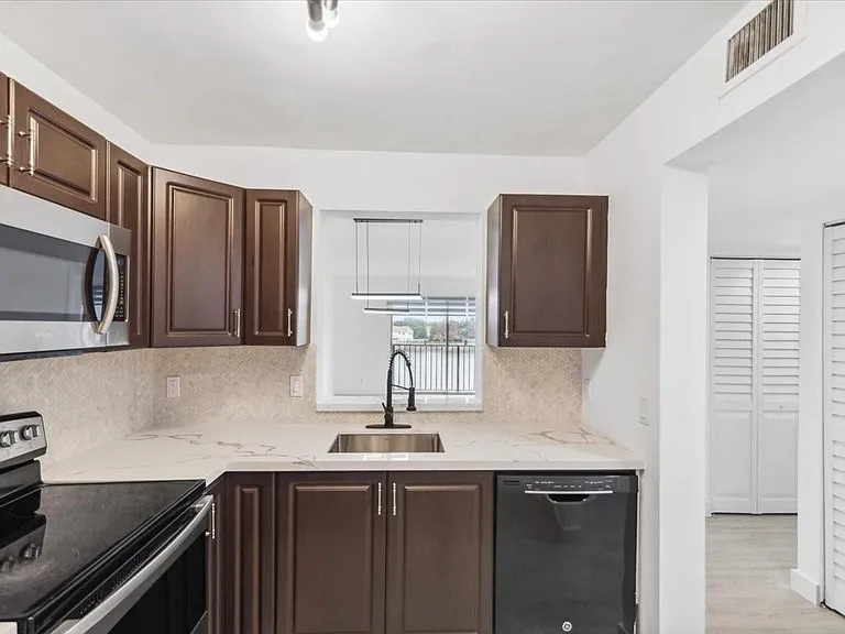 8700 N Sherman Cir — Photo 1