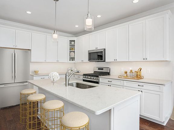 Well-Appointed Kitchen with Center Island, Ample Counter and Storage Space