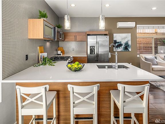 Plenty Kitchen Counter Space for Sitting and Entertaining. 