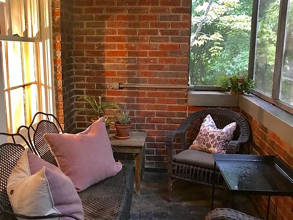 Lovely porch off of living room (photo of different unit in bldg)