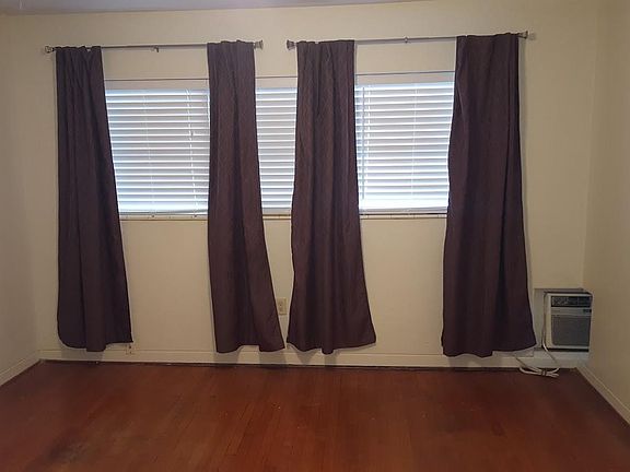 Large Bedroom with wall of windows for natural light, or use