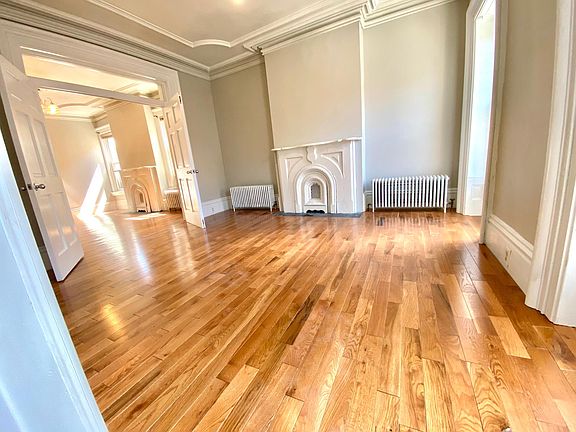 Front parlor. Could also be a bedroom.