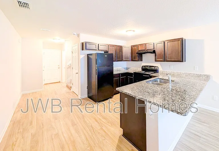 8511 McGirts Village Ln — Photo 2